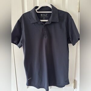BYLT polo shirt. Size: Medium. Color: Navy blue.
